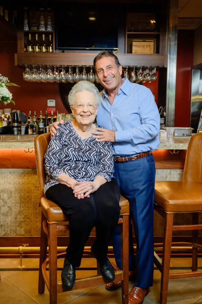 Rosie Carrabba and her son, Johnny Carrabba, at the family's namesake restaurant on Woodway (Photo by Si Vo Photography)