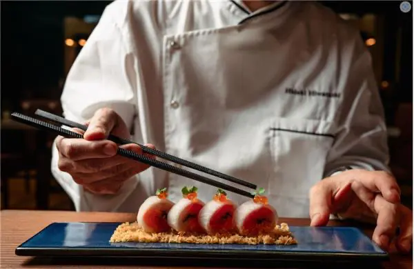 Beautifully presented maki rolls include the Naruto, named for the Naruto Strait in Awaji and Shikoku, which blends salmon, chutoro and hamachi with shiso leaves all wrapped with pickled daikon and served with a Yuzu ponzu. (Photo by Brian Kennedy)