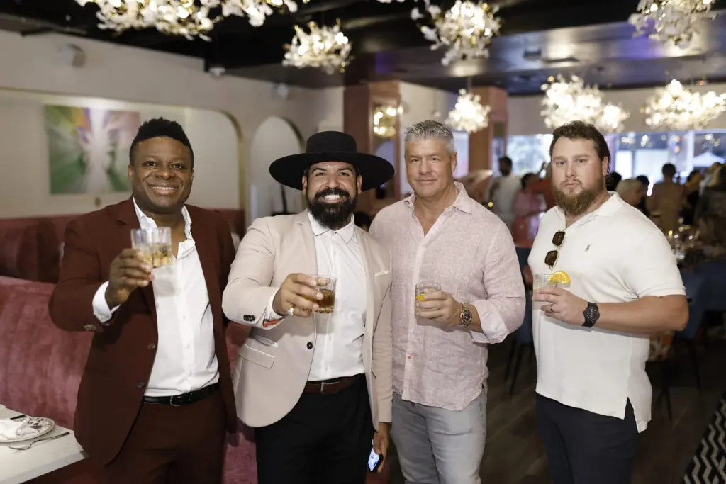 Obi Ibeto, Phil Sanchez, Brandon Outlaw, Erik Williams at the American Cancer Society 'Men Wear Pink' event at PostScript (Photo by Quy Tran)