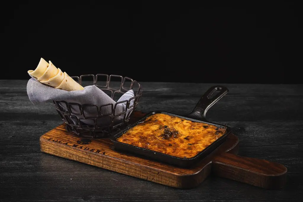 For starters at Toca Madera, don’t miss the unctuous queso fundido ($17), a melted blend of chihuahua cheese, soyrizo (a soy-based chorizo sausage) with sauteed onions and mushrooms to be rolled in warm flour tortillas.