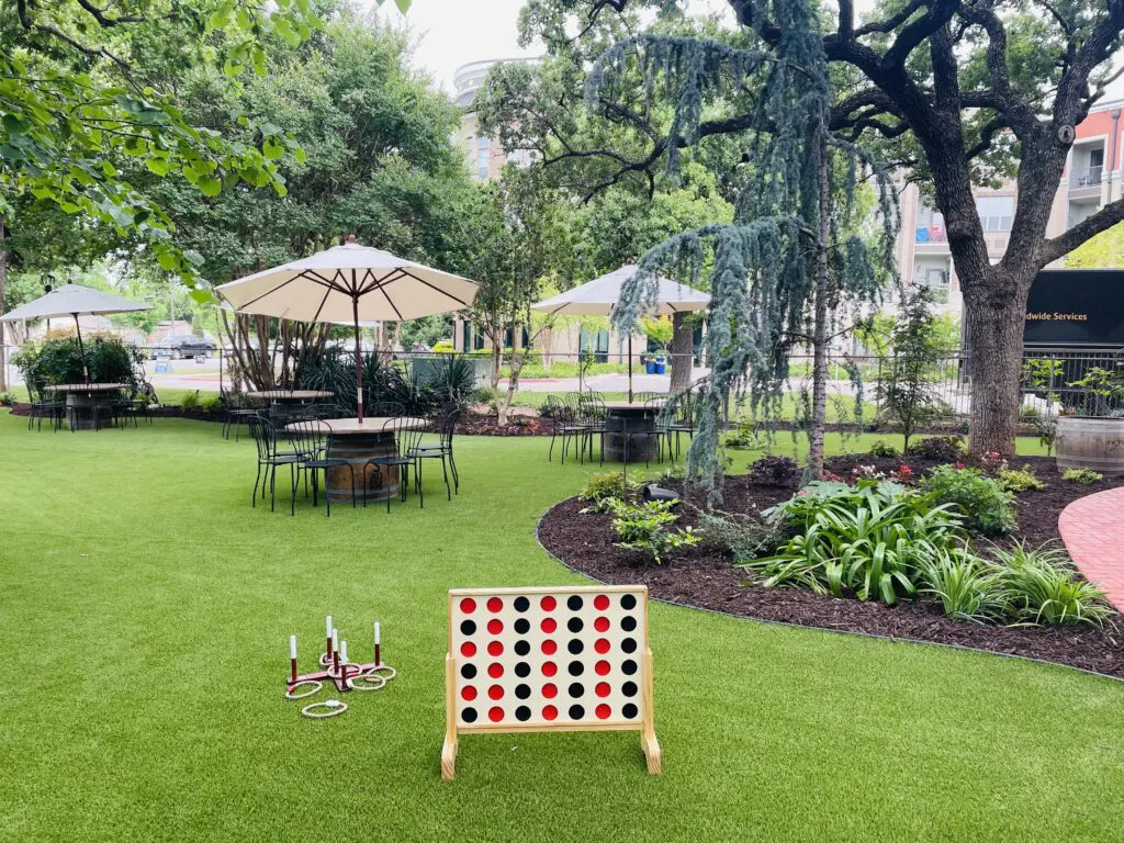 Saddlerock – The shady front lawn with seating and games at Saddlerock Wine + Beer Co. (Photo by Courtney Dabney)