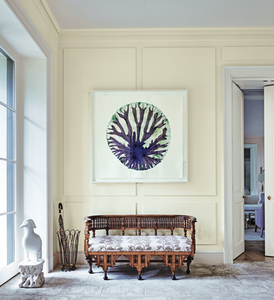 In the entryway, a circa-1900 Anglo-Indian bench from Obsolete, L.A., upholstered in Kerry Joyce fabric from George Cameron Nash. Umbrella stand from Orange, L.A. Marble bird from JED Interior Design and Antiques, East Hampton. Liz Ward painting from Talley Dunn Gallery.  (Photo by Richard Powers)