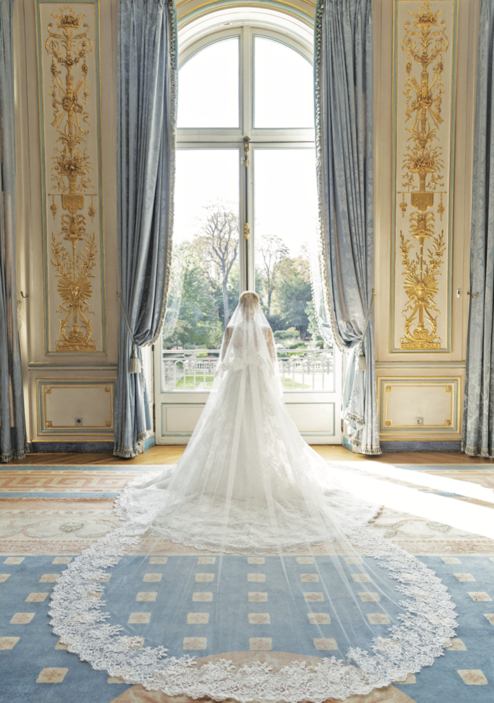 Bride Maggie Phillips in wedding gown by Monique Lhuillier at Cercle de I’Union Interalliée, an exclusive private club in Paris. (Photo by John Cain Photography)