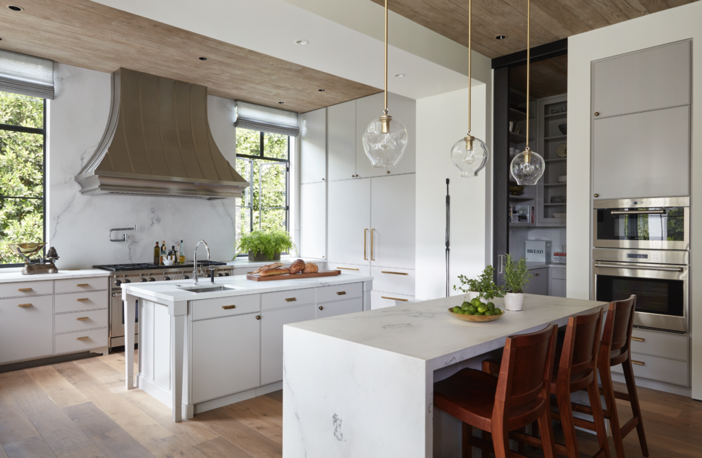 MLK Studio: white marble, gray Farrow and Ball cabinets two islands. (Photography by Roger Davies)