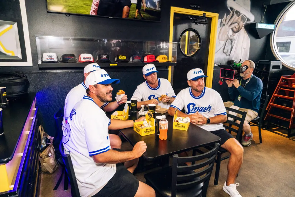 The Smash GC team of Brooks Koepka, Jason Kokrak, Talor Gooch and Graeme McDowell enjoyed some burgers in Houston. (Photo by Dylan McEwan)