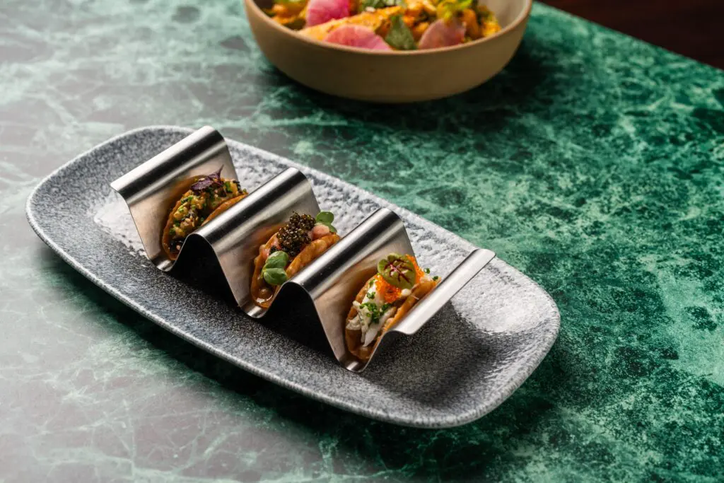 Crunchy and creamy snow crab tacos are a creative starter at Soy Cowboy. (Photo by Brian Kennedy)