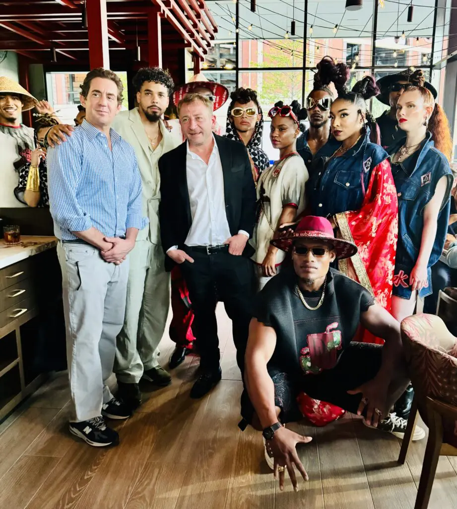 Designer Dreux' Hamm and his models pose with owner Ben Berg at Soy Cowboy's VIP Opening Party. (Photo by Courtney Dabney)