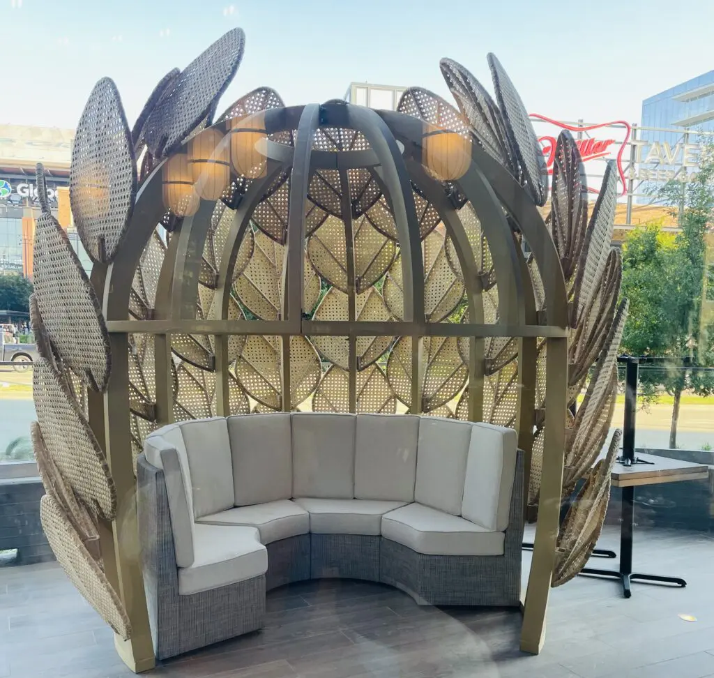 One of the woven lotus blossom seating options on the extensive patio. (Photo by Courtney Dabney)