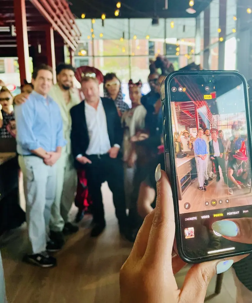 Influencers capture owner Ben Berg posing with fashion models and designer Dreux' Hamm. (Photo by Courtney Dabney)