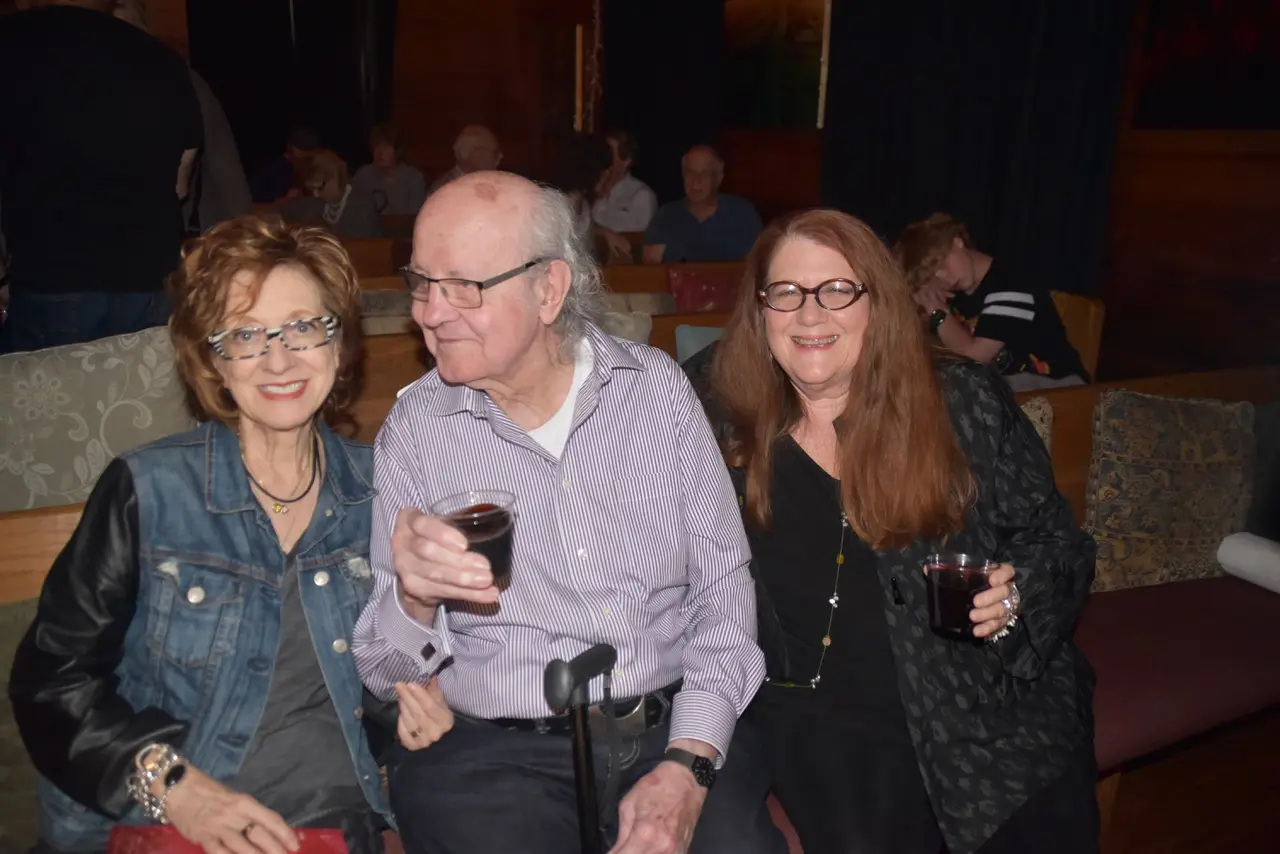 Anya Tish, artist H.J. Bott and arts writer Donna Tennant celebrate after a gallery opening.