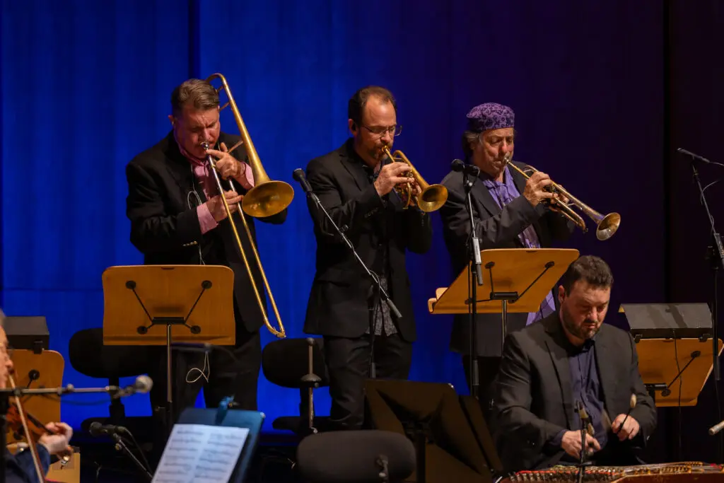 From left: Mark Hamilton (trombone), Mark Berney (trumpet), and Frank London (trumpet). (Photo by Melissa Taylor)