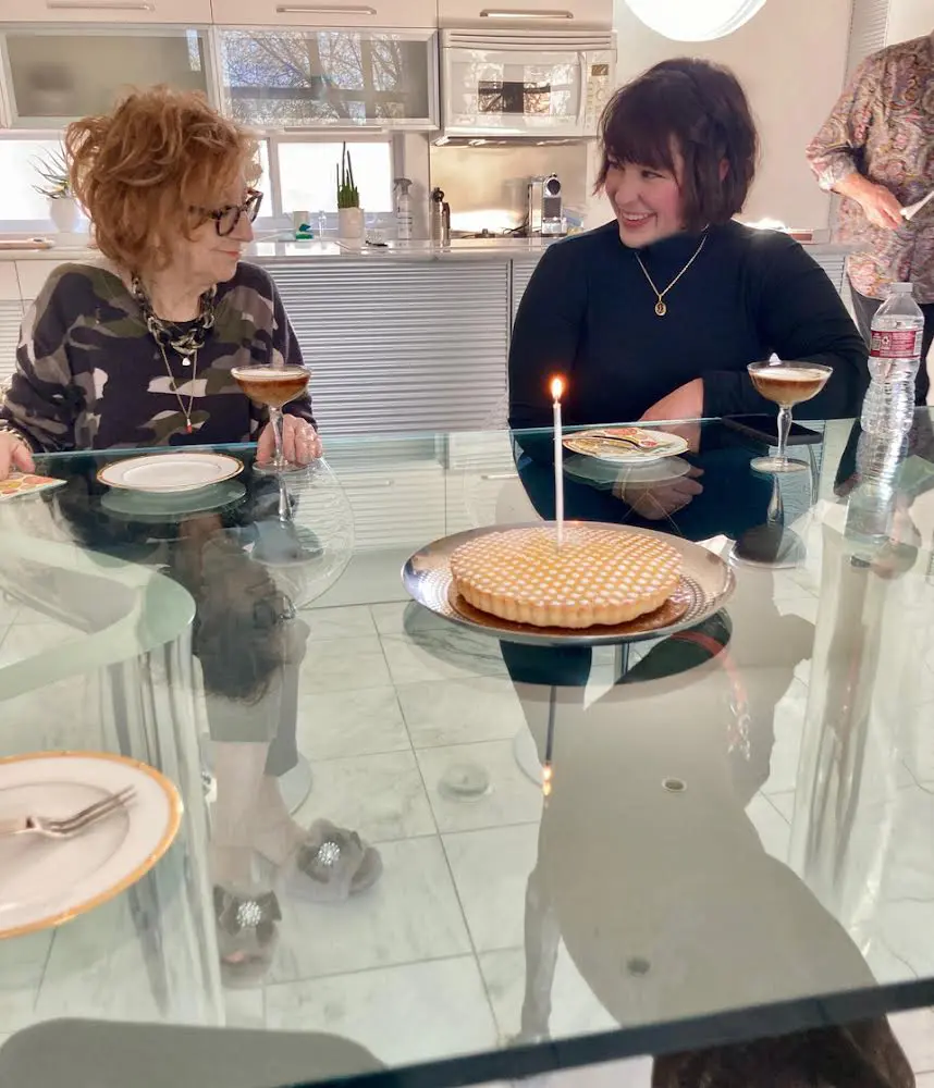 Anya Tish and gallery director Dawn Ohmer during a happy occasion at Tish’s home.