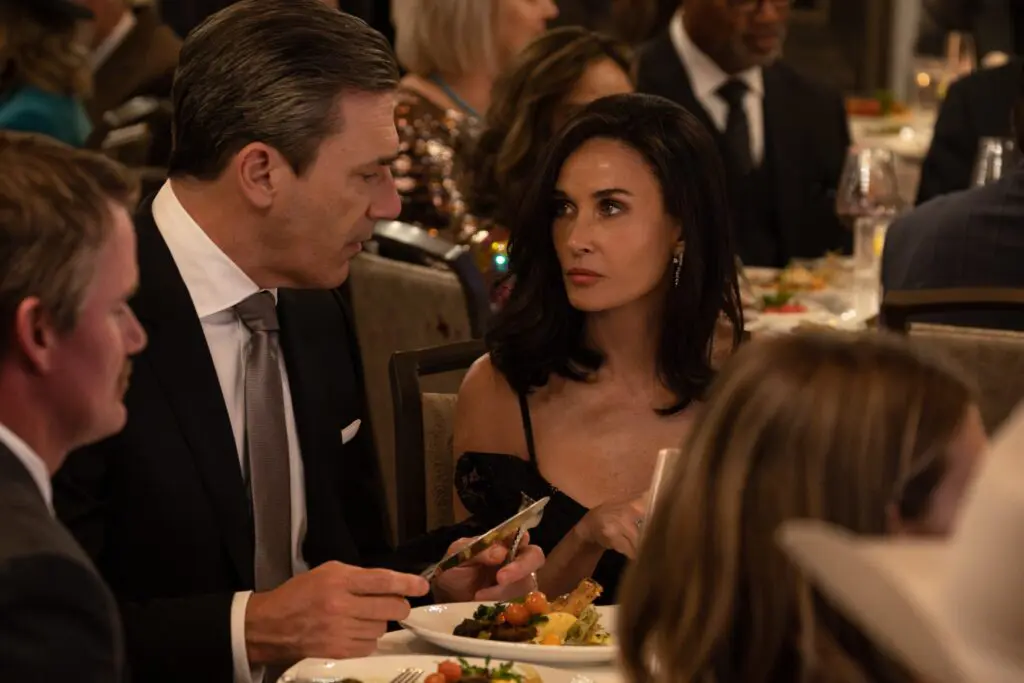 Jon Hamm and Demi Moore attend a charity event in the upcoming "Landman" series.