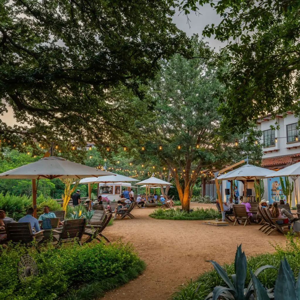 Hotel Drover's shady backyard hosts guests, parties and concerts.