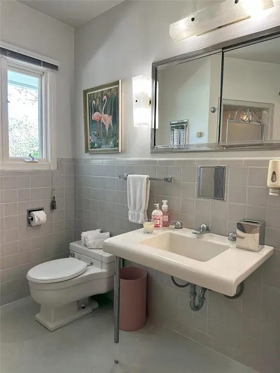 One of three full bathrooms.  (Photo by Douglas Newby & Associates)