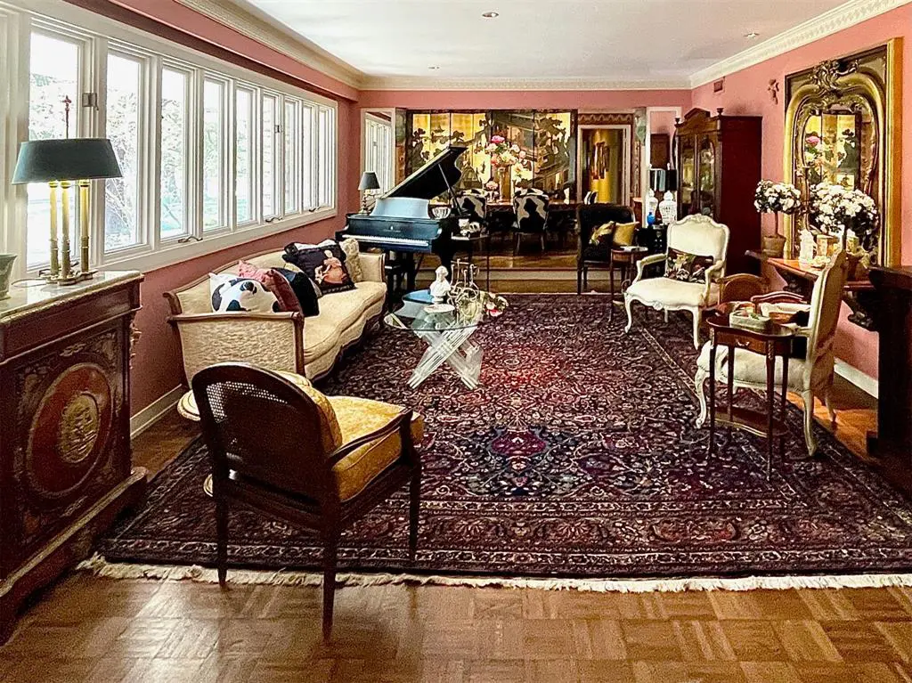 A look at the gracious formal living room in Preston Hollow.  (Photo by Douglas Newby & Associates)
