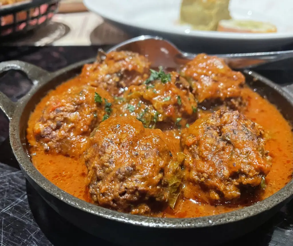 At Si Tapas, the albóndigas estilo Si is a house specialty of the tenderest beef meatballs. (Photo by Courtney Dabney)