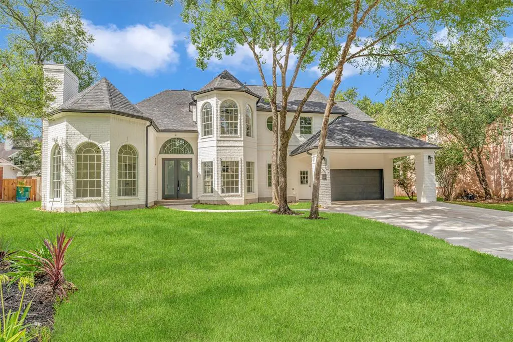 A modernized Panther Creek gem can be found at 23 Treasure Cove Drive. 