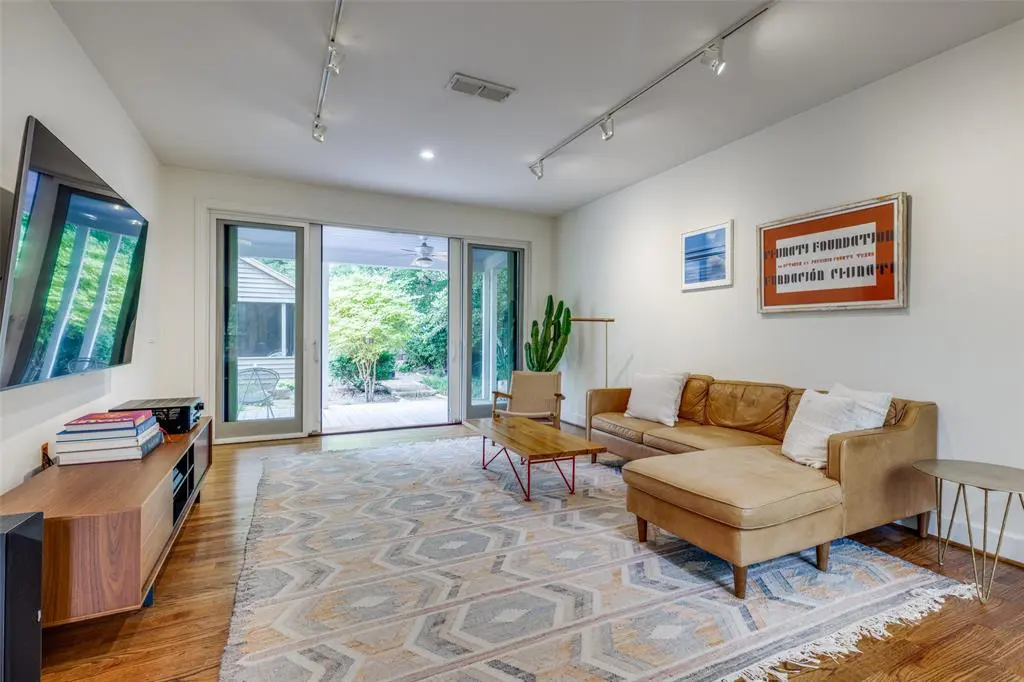 A living area with verdant views.  (Photo by Micalizzi Real Estate)