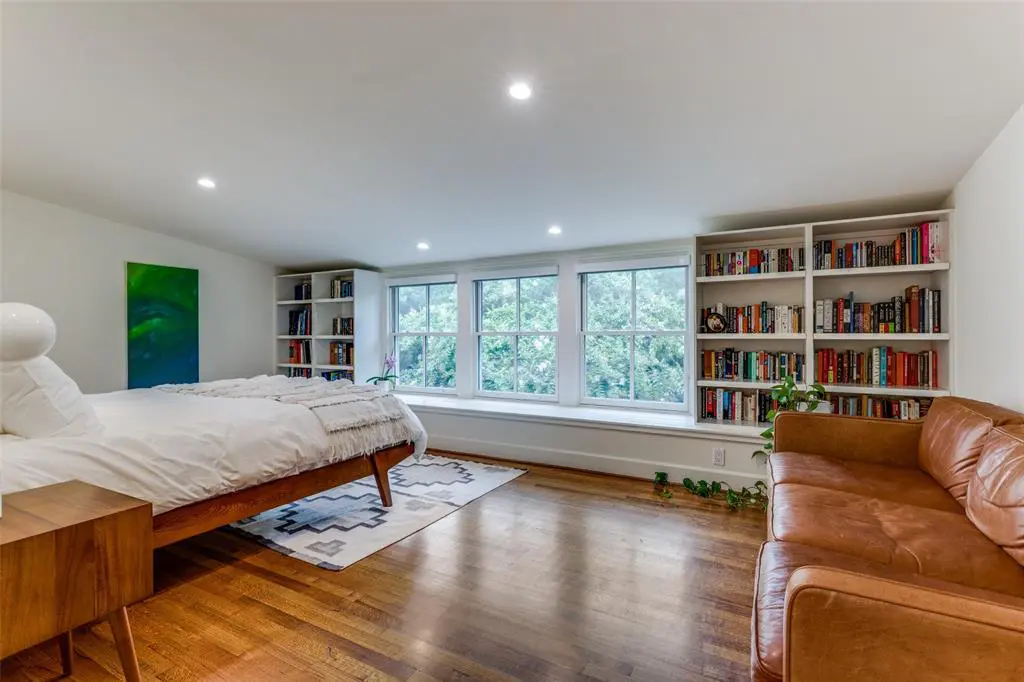 Charming built-ins and a banquette in a bedroom. (Photo by Micalizzi Real Estate)