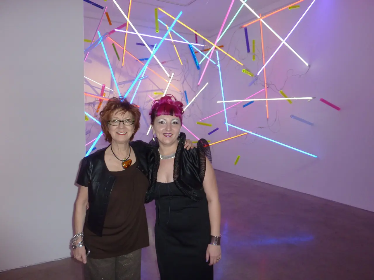 Anya Tish with another discovery, artist Adela Andea, at her illuminated installation at the gallery.