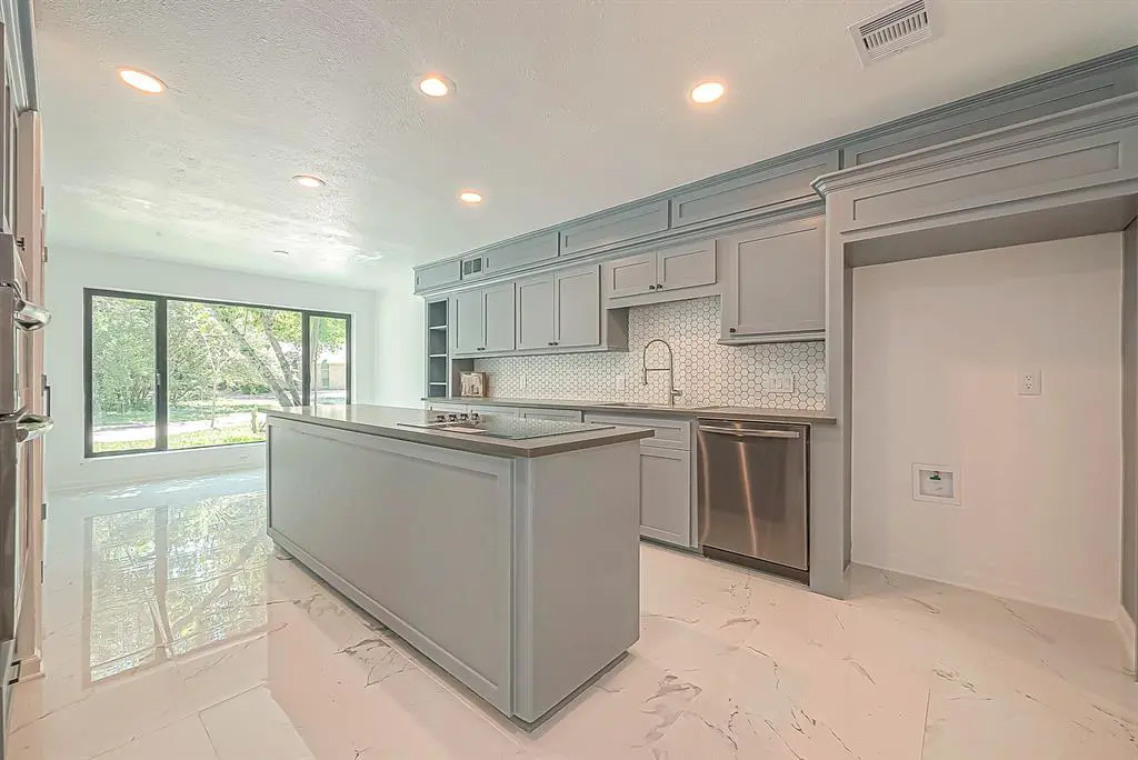 The stylish kitchen inside 66 Lazy Lane is modern and convenient. 