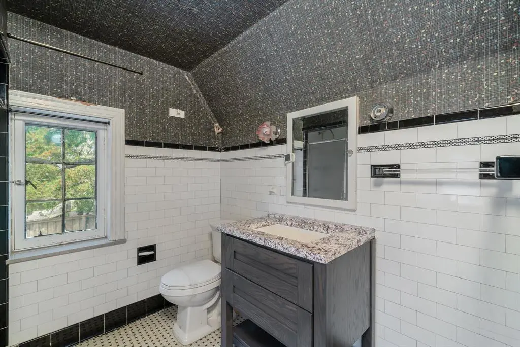 One of eight full bathrooms in the home. 