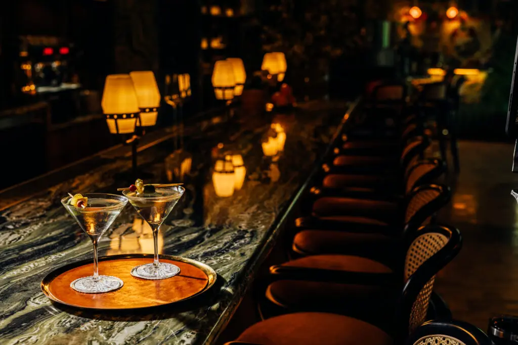 The beautifully appointed bar features cocktails (even those free of spirits) that are twists on the classics from martinis ($18-$20) to gin and tonics (made with marigold-infused gin, natch, $18) to a Victorian punch ($18) stirred up with brandy, bonito flakes, and clarified milk punch. (Photo by Arturo Olmos )