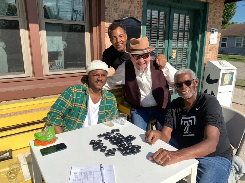 Artists Angelbert Metoyer, Rick Lowe, Ernesto Leon and the late Floyd Newsum played a game of dominos at Project Row Houses. Lowe and Newsum co-founded Project Row Houses with five other artists in 1993. (Photo by Ernesto Leon)