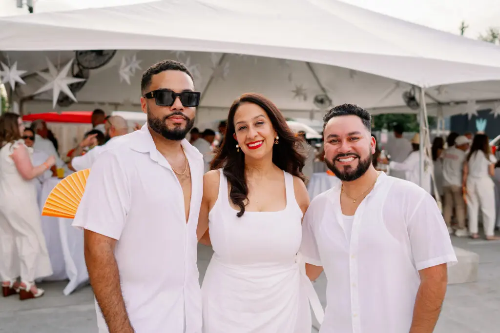 Phil Gilbert, Carmeli Gonzalez, Jose Nieto at Nan & Company Properties' White Linen Night in The Heights soirée.