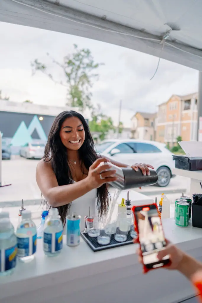 The Booze Babe mobile bar service at Nan & Company Properties' White Linen Night in The Heights soirée.