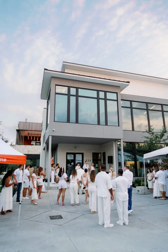 Friends at Nan & Company Properties' White Linen Night in the Heights soirée.