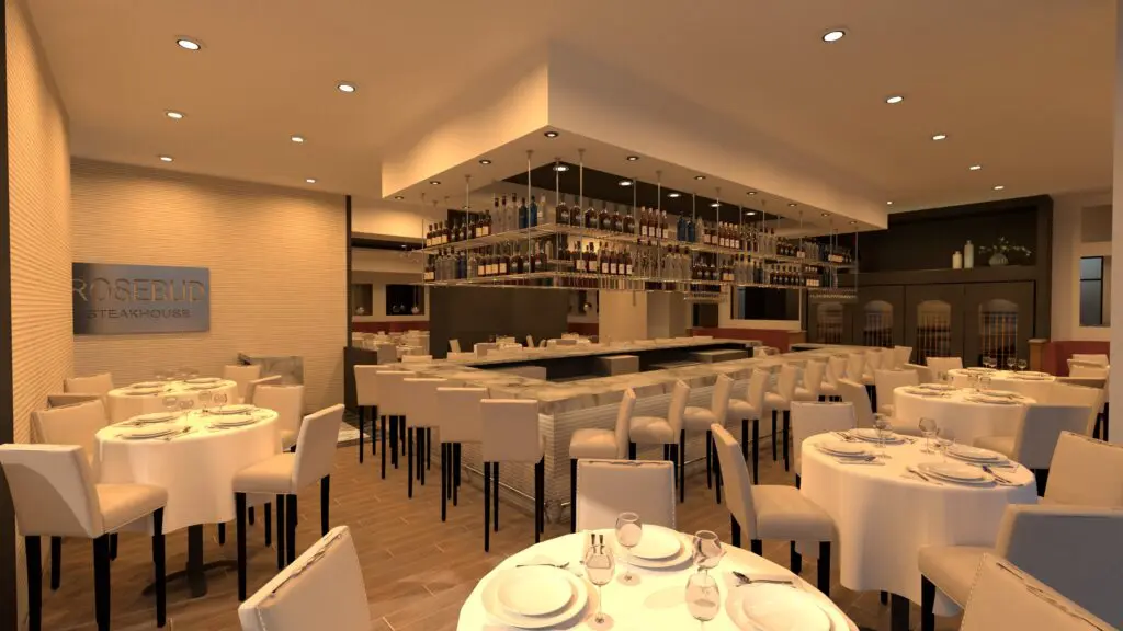 The bar area has a view into the main dining room at Rosebud Steakhouse.