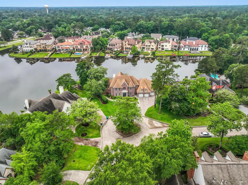 The lakefront gem at 15 Shoreline Point Drive is a stunning option on today's real estate market. 