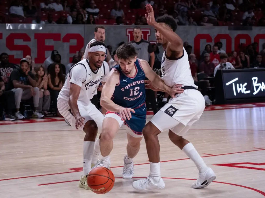 Former University of Houston player Wes Van Beck knows how to dribble out of trouble. And he always feels at home around the Sampsons. (Photo by F. Carter Smith)