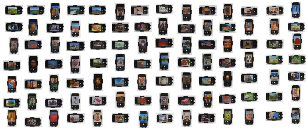 John Slaby's "Through The Phone," 2022 features 100 small wooden paintings of iPhones. (Photo courtesy of Archway Gallery)
