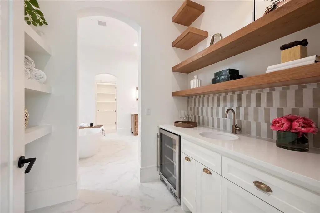 The master bath has its own coffee and cocktail bar.