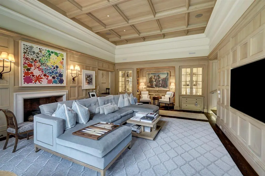 The media room at 3 Briarwood Court is ideal for couch potatoes watching the Olympics. (Photo by TK Images for Compass)