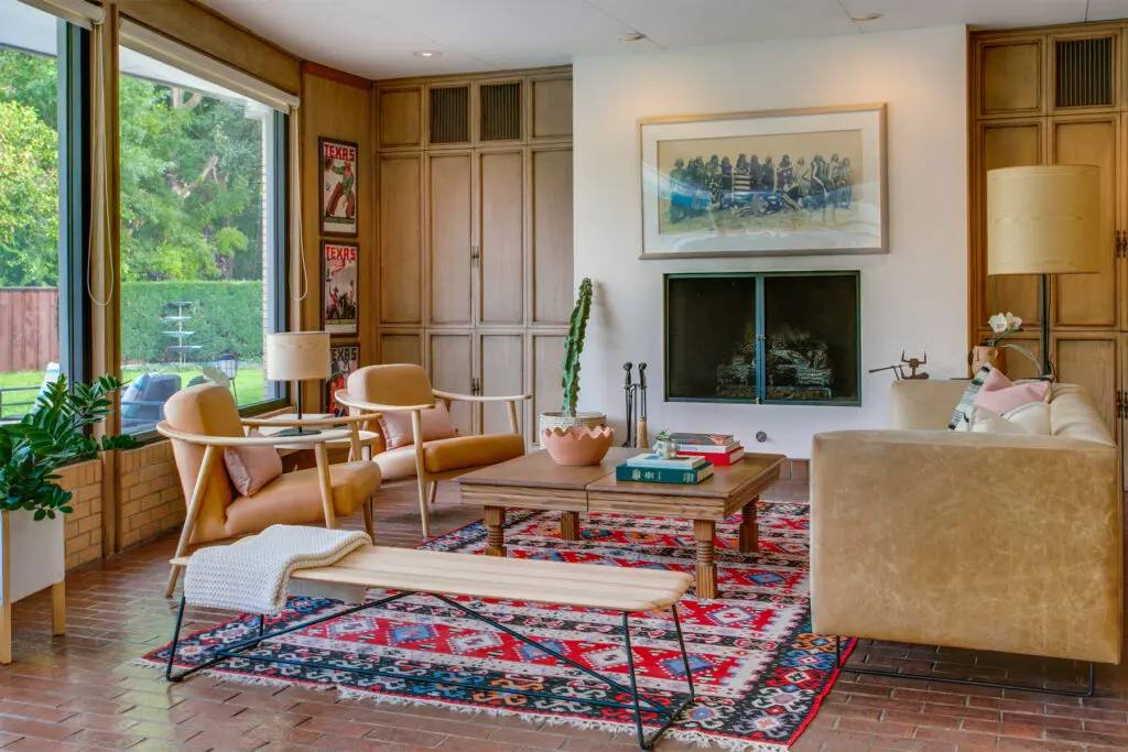 One of three expansive living areas, each of which includes custom-built cabinetry. 
