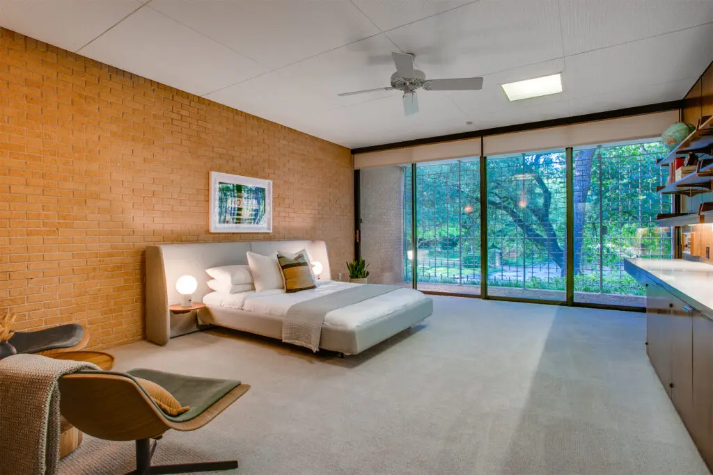 A minimal bedroom in the mid-century Dallas home.