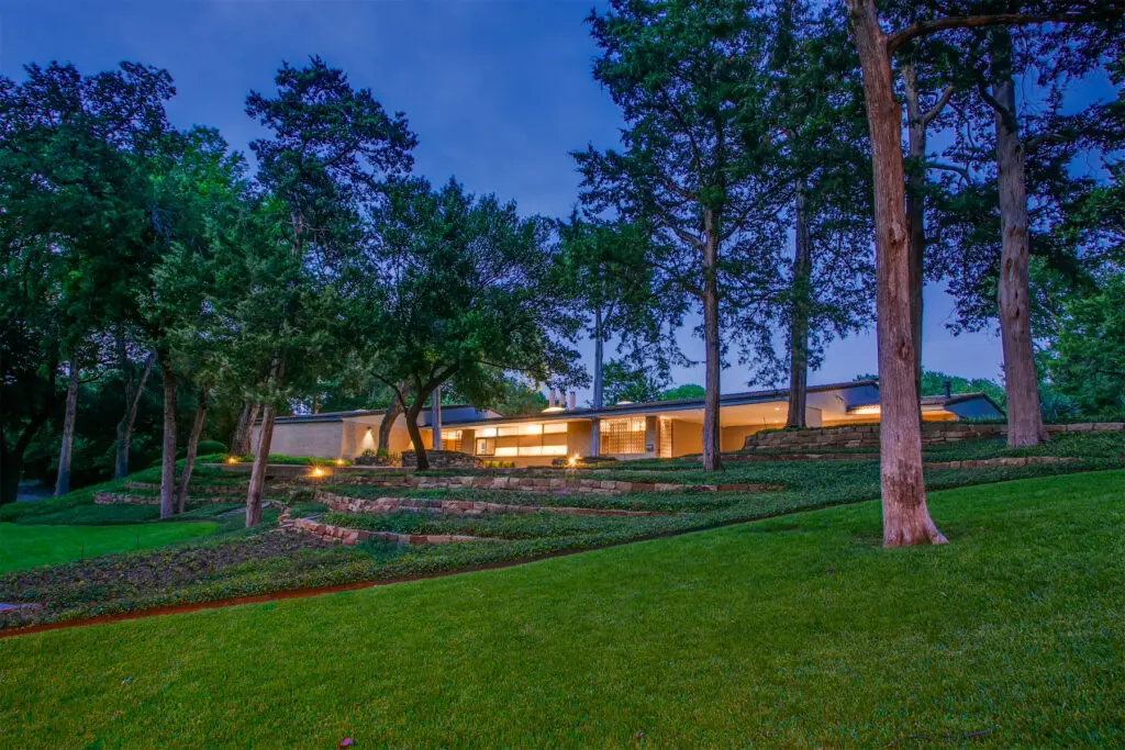 The 6,416-square-foot residence is built on a 2.09-acre lot in Dallas' sought-after Kessler Lake Estates neighborhood.