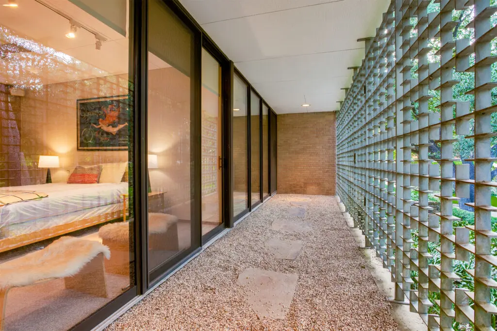 Original ironwork that conceals the walls of glass.
