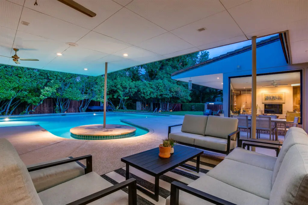 A poolside seating area.