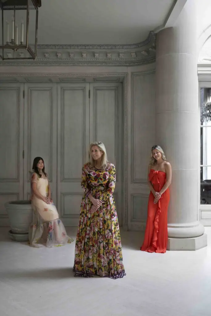 Interior designer Carla Fonts, center, with her Dunbar Road design team: from left, Eugenie Gallinghouse and Lexi Aitken. Paneling and molding in background salvaged from the Music Room at Rose Terrace. (Photo by Pär Bengtsson)