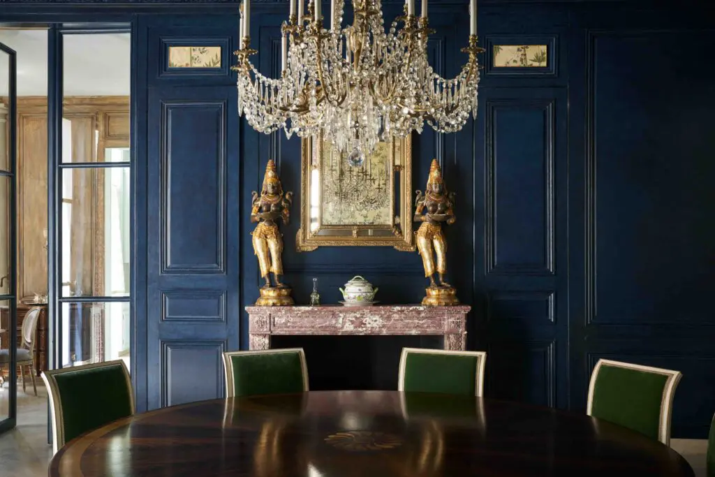 In the Young Estate in Fort Worth, the dining room’s antique fireplace is from England. Many of the house's fireplaces, chandeliers, and paneling came from palatial residences around Europe such as Mentmore Towers, a 19th-century English country house built for the Rothschild family. This room is among others that will undergo an upcoming gentle refresh by Dunbar Road. (Photo by Pär Bengtsson)