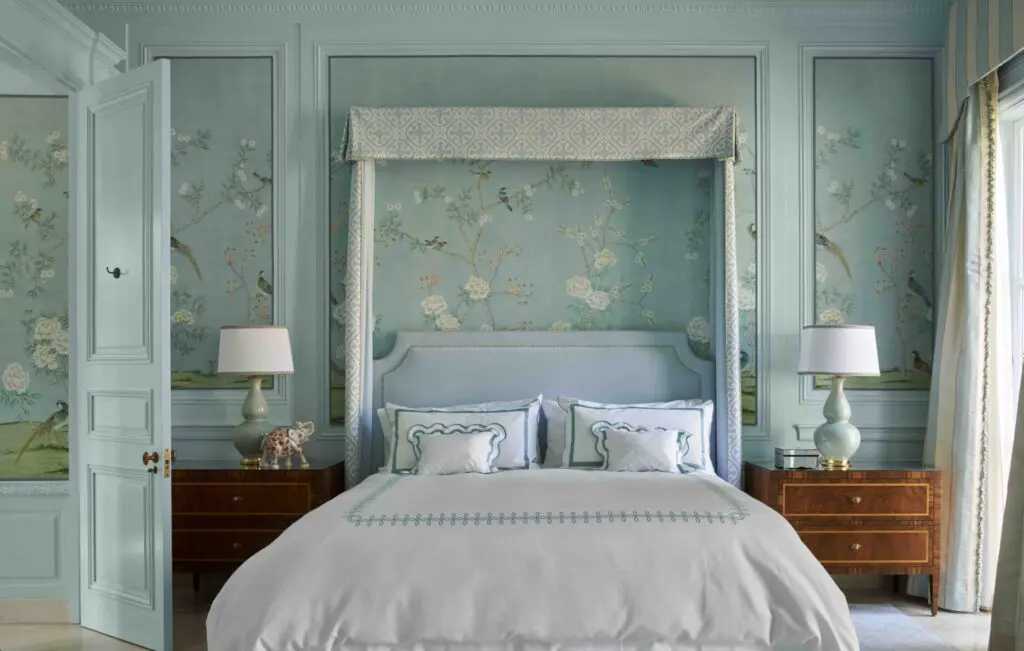 A hidden bedroom in Fort Worth's Young Estate, with wallpaper from The Mural Source with Samuel & Sons braiding.
Custom canopy bed upholstered in Scalamandré fabric. Custom French walnut nightstands with sycamore inlay.
Christopher Spitzmiller lamps. Bedding by Moureau Home. (Photo by Pär Bengtsson)