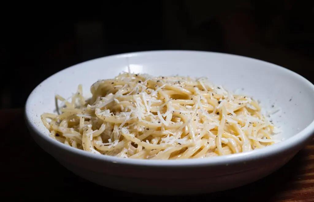 The chewy spaghetti of this simple carbonara at Bocca Osteria Romana is dressed in egg yolk, cracked pepper, and pecorino Romana cheese. (Courtesy)