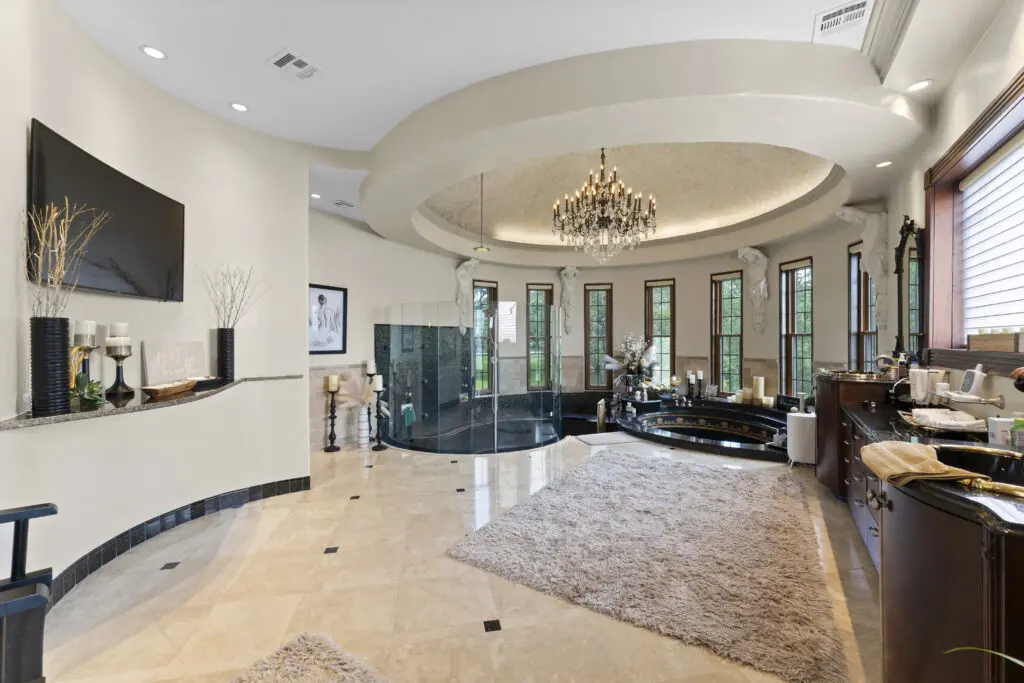 The elaborately decorated primary bath  at 401 Lakeshore Drive in El Lago, Texas.  (Photo by Iconic Images)