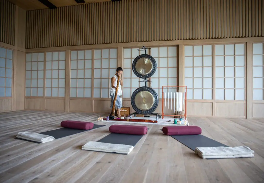 Many people struggle to meditate for extended periods, but the sound-based rituals like the gong bath and Tibetan bowls at Palmaïa bring participants closer to that elusive meditative state. (Photo courtesy Palmaïa-The House of Aïa) 