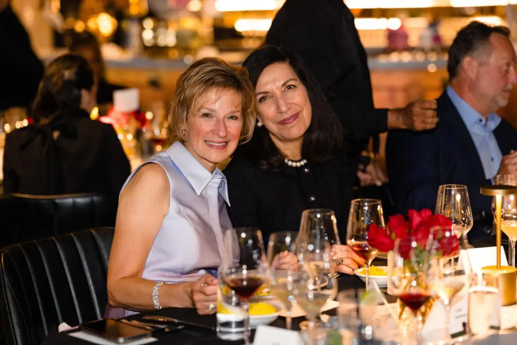 Barbra Feigin (l) and Huda Zoghbi (r) at Amrina.  Dr. Zoghbi spoke about the work that the Duncan NRI is doing.